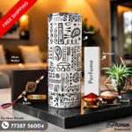 Doodle art tumbler hamper showcasing a personalized wallet and graphic insulated tumbler Complete unboxing view of the doodle art tumbler hamper with festive essentials and perfume