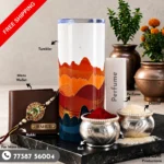 Terracotta hills tumbler hamper showcasing a custom engraved wallet, terracotta tumbler, perfume, Rakhi, roli, and chawal Flat lay setup of the terracotta hills tumbler hamper featuring warm landscape-inspired accessories and personalized items