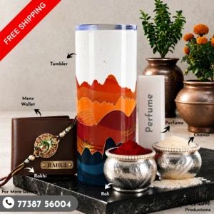 Terracotta hills tumbler hamper showcasing a custom engraved wallet, terracotta tumbler, perfume, Rakhi, roli, and chawal Flat lay setup of the terracotta hills tumbler hamper featuring warm landscape-inspired accessories and personalized items