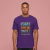 A man wearing a purple t-shirt featuring the Chai Premi 24/7 Fueling The Day graphic.