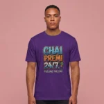 A man wearing a purple t-shirt featuring the Chai Premi 24/7 Fueling The Day graphic.