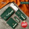 Green women's wallet hamper featuring a custom engraved clutch, passport cover, keychain, and sunglasses case Unboxing layout of the green women's wallet hamper showcasing personalized leather accessories and mini perfume