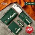 Green women's wallet hamper featuring a custom engraved clutch, passport cover, keychain, and sunglasses case Unboxing layout of the green women's wallet hamper showcasing personalized leather accessories and mini perfume