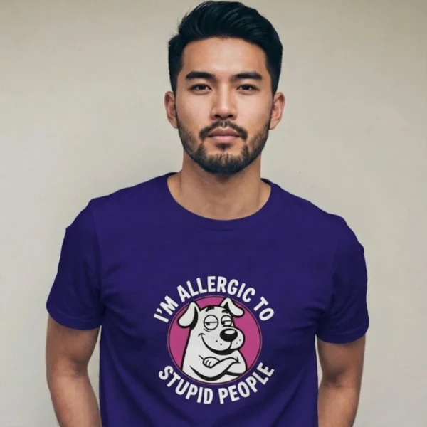 Man wearing a t-shirt featuring a cartoon dog graphic with crossed arms and the text I'M ALLERGIC TO STUPID PEOPLE