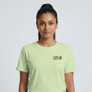 Model facing camera wearing a coffee addict t-shirt with minimal chest cup icon