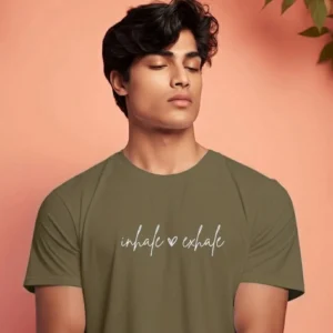 Close-up front chest view of the inhale exhale t shirt cursive typography detail