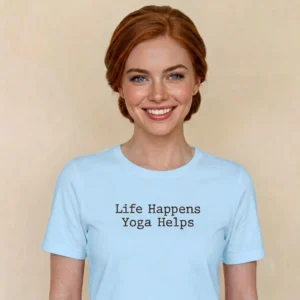 Close-up chest graphic detail of the life happens yoga helps t-shirt featuring centered dark typewriter font