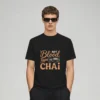 Man wearing a My blood type is chai graphic t-shirt