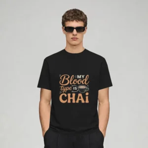 Man wearing a My blood type is chai graphic t-shirt