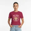 Close-up chest view of the my soul runs on chai t shirt typographic botanical detail